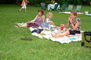 Folks relaxing on the lawn