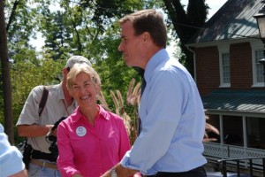 Nelson Central District Supervisor, Connie Brennan, greets Warner at the courthouse.