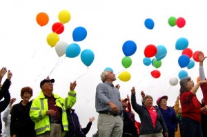 Left, Frank Ott, with Doug Coleman, TWNF Director, And Others Release Balloons In Memory Of Sara Ott