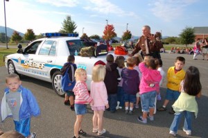chd14 A deputy with The Nelson County Sheriff's Department talks about all of the equipment in his car.