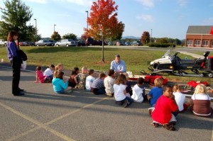 A member of Wintergreen Ski Patrol demonstrates how snowmobiles are used in their job.