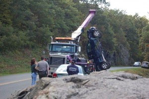Photos Submitted By Catherine Lively : Stoney Creek Auto of Nellysford lifts, what's believed to be a stolen truck, from Ravens Roost Saturday afternoon