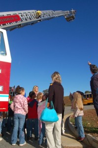 Students check out the new ladder truck used by Wintergreen.