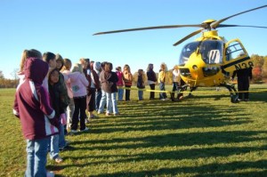 Students line up for a chance to look inside Air Care-5.