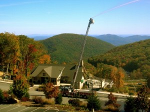 Photo Courtesy of Wintergreen Fire Department : New ladder truck extends above the Fall mountains at Wintergreen Resort : October 2008