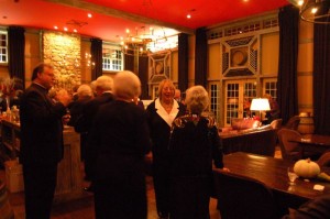 Guests mingle in the main tasting room at Veritas.