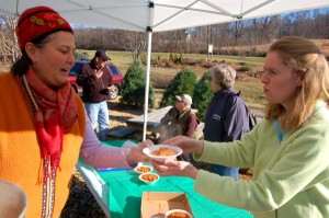 Folks got in line to get some stew while others picked out Christmas trees or listened to live music.