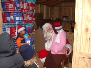 Photos By Nelson County Pantry : Santa chats with one of the kids that came by this past weekend.