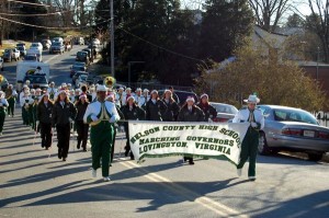 The Nelson County High School Marching Governors Band takes to the street in Sunday's Christmas Parade.