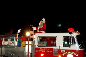 Photos By Tommy Stafford ©2008 NCL : Santa arrives not by sleigh but on a Wintergreen Fire Truck Wednesday night at Stoney Creek in Nellysford, Virginia