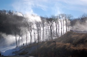Snow making gear at Wintergreen fills the air with light snow over the slopes.