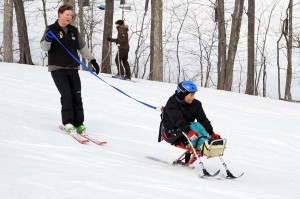 Photos By Paul Purpura :©2009 NCL Magazine : One of the Wounded Warriors takes a trip down one of the slopes Saturday at Wintergreen Resort.