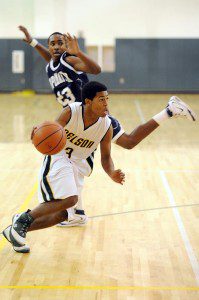 Photos By Paul Purpura : ©2009 NCL Magazine : Trey Barnett, a junior at NCHS, makes a run down the court Friday night against Appomattox. Click on any image for larger view.