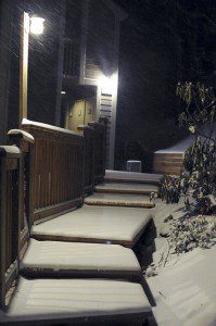 A blanket of snow covers the walkways into condos at Wintergreen Monday night.
