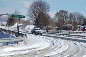 ©2009 NCL Magazine : Roads in Nelson County, Virginia are slowly clearing with sunshine and VDOT crews doing their part.