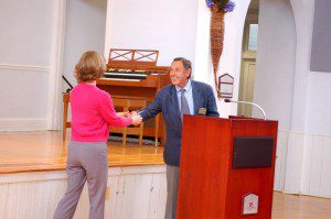 ©2009 NCL Magazine : Andrew Hodson (right) co-chair of NCCF,  hands Peggy Whitehead, Executive Director of Blue Ridge Medical Center,  one of the many grants awarded at Tuesday afternoon's ceremony.