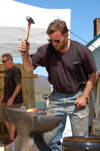 folk-fest-0725 Gerald Boggs, owner of Wayfayer Forge in Afton, demonstrates at the 2007 event.