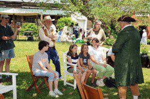 Visitors are greeted by historical interpreters.
