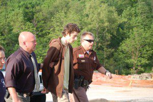 ©2009 NCL Magazine : Photo By Tommy Stafford : Austin Griffin being led to a Nelson County Court last month on the day of his arrest May 11th. 