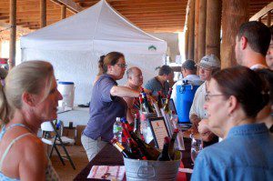 Sarah Gorman with Cardinal Point Vineyard & Winery pours up some wine for folks dropping by the festival this past weekend. 