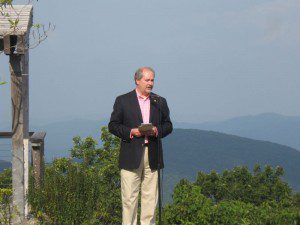 VA Secretary of Natural Resources, Preston Bryant, speaks at the official dedication with much of the preserved mountain land in the background