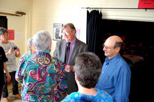 ©2007-2009 NCL Magazine : Earl Hamner, JR (left) with writer and friend, Woody Greenberg (right) talk to fans at The Hamner Theater in 2007. 