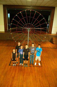 Photo By Tommy Stafford : ©2009 www.nelsoncountylife.com : Chris Hodge (center) stands with his brothers and cousin that helped build this giant replica of a Ferris Wheel @ RVCC.