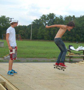 Jacob Lane looks on as Colin Bruguiere of Afton tries out the Sk8 Nelson Skate Park that officially opens Saturday morning @ 10 AM!