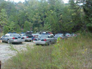 A large number of state police vehicles park near the search area on Wednesday of this week. 