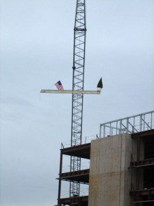 The final steel beam represents part of 5,000,000 pounds of steel necessary to build the new faciility. 