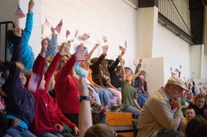 ©2008-2009 www.nelsoncountylife.com : Students at Rockfish River Elementary wave American flags in honor of veterans at the 2008 Veterans Day Program in Afton, Virgina