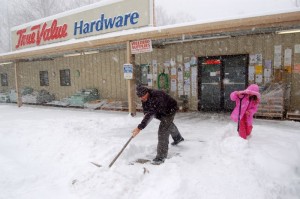 All Photos ©2010 www.nelsoncountylife.com : By Tommy Stafford : Danny Watson co-owner of Wintergreen Hardware in Nellysford, Virginia shovels snow with daughter Noel early Saturday morning. Click any photos to enlarge.