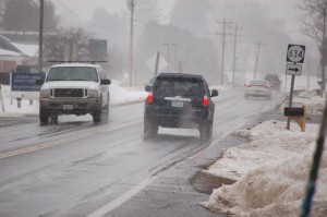 Photos By Tommy Stafford : ©2010 www.nelsoncountylife.com : Drivers scurry down Route 151 in Nelson County as snow started mid-afternoon Tuesday. 