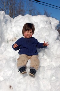 Now that Adam has finished piling up the last snow, he waits on the next!