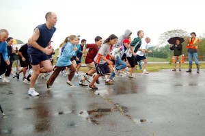 Photos By Tommy Stafford : ©2010 www.nelsoncountylife.com : With rainy skies over Afton, runners in Saturday's 5K race take off!