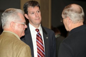 Todd Haymore, VA Secretary of Agriculture and Forestry, talks to people at Friday night's convention. 