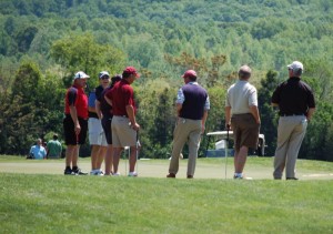 ©2010 www.nelsoncountylife.com : Golfers took advantage of full sunshine and warmed up on the putting green at Stoney Creek Thursday afternoon before the kick off of the golf classic. 