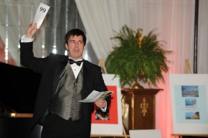 James Muncey conducts the live auction which was followed by a Viennese dessert buffet.