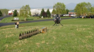 Photos Courtesy Of CVEC : A helicopter and pilot outfitted with an airborne saw prepares for takeoff from the CVEC offices in Arrington. Click any photo to enlarge.  