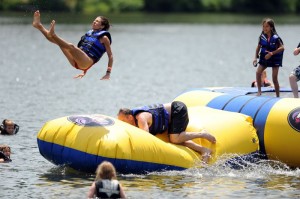Photos By Paul Purpura : ©2010 www.nelsoncountylife.com : Youngsters take the plunge into Lake Monacan at Stoney Creek on Memorial Day. 