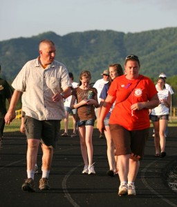 Mike Pappas and Margie Rossenberry walk the track at Nelson County High school during the Relay for Life held Saturday May 15, 2010.