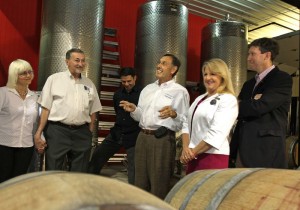 Andrew Hodson, at center, owner of Veritas Vineyard and Winery in Afton, Va. talks about winemaking with Maureen McDonnell, wife of the Virginia Governor and Todd Haymore, the Virginia Secretary of Agriculture and Forestry, at right, duirng a tour and tasting of the winery