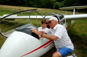 12 year old, Justin Stgura, of Stuarts Draft listens as Graham Pitsenberger, President of SVS, discusses instruments in one of the gliders.