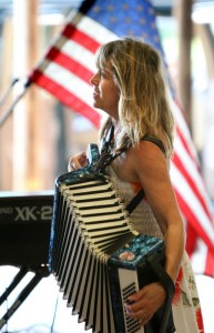 Photos By Norm Shafer : ©2010 www.nelsoncountylife.com : With mid 90s temps in the air, Betty Jo Dominick plays the accordion with the Rogan Brothers  Band at the Summer Solstice Festival, this past weekend at Lazy Days Winery / Amherst Estate Vineyards in Amherst, Va.