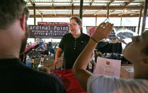Sarah Gorman, business manager at Cardinal Point Winery talks about their wines during a tasting at the Summer Solstice Festival.