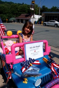 Photos By Tommy Stafford : ©2010 www.nelsoncountylife.com : 5 year old Krystina Smith of Schuyler gets ready to enter the annual 4th of July Parade at Lovingston this past Monday. Click any images to enlarge.  