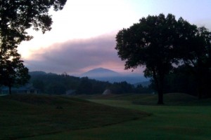 Photo By John Holman : Smoke hangs in the air just before daylight in Stoney Creek. 