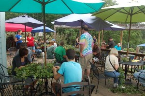 Countless people covered the deck at Blue Mountain Monday afternoon to pick the hops from the vines. 