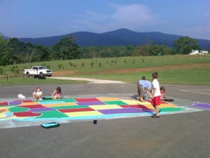Photo Courtesy of Lisa Stewart : Parents and students have also been spending the summer sprucing up the huge U.S. Map on the pavement at RRES.