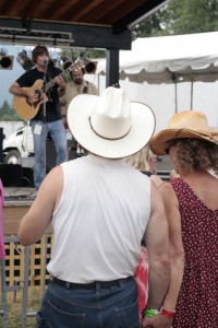 fans Fans dance to the tunes at the 2010 festival.
